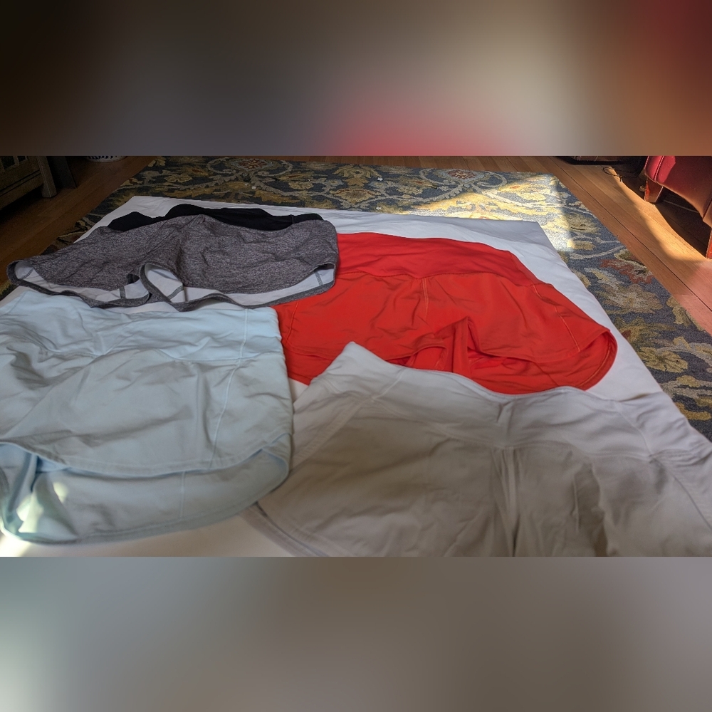 Four Pair Of Lululemon running Shorts.